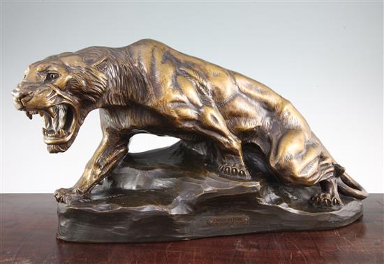 Thomas Francois Cartier (1879-1943). A French Art Deco painted terracotta model of a snarling panther, 24in.